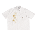 Apricot shirt with floral design 