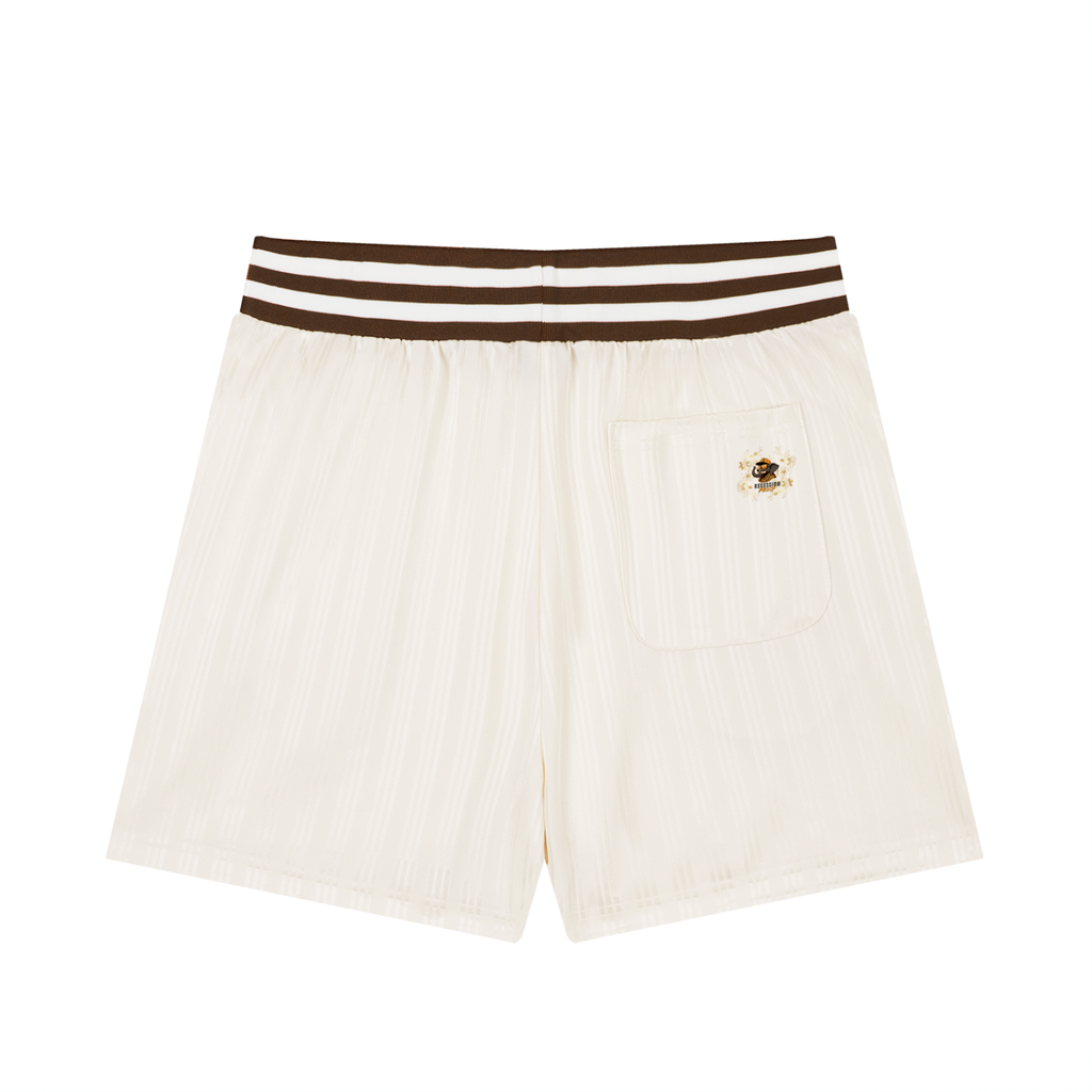 Apricot shorts with a stripped waistband.