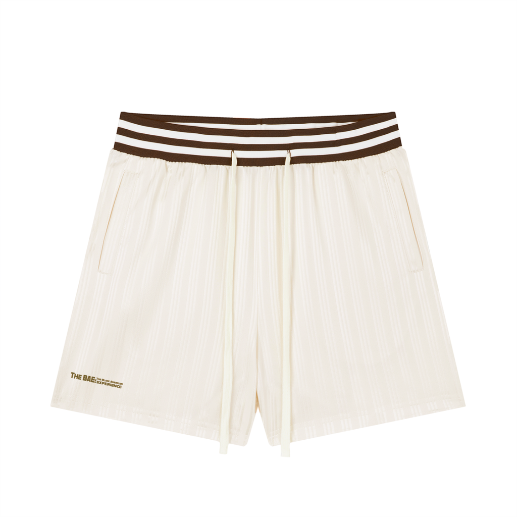 Apricot shorts with stripped waistband.
