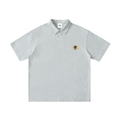 Light gray polo shirt with a Recession Proof Clothing logo on the chest.